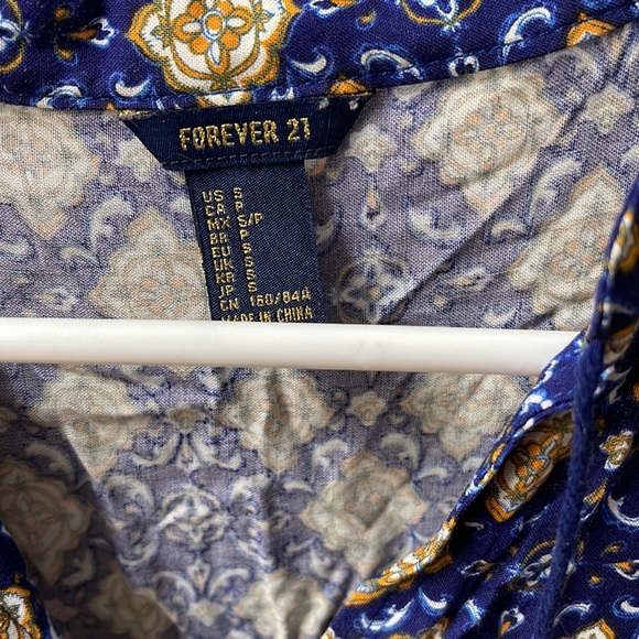 This is a forever 21 dress its very nice meant for a small physique, gently worn - Picture 2 of 3